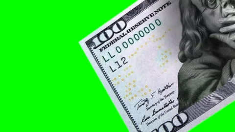 A hand saw saws the US dollar. Stock Footage 245445044