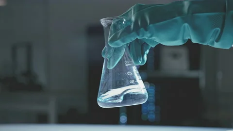 Hand of scientist checking test tube in laboratory Stock Footage 149244829