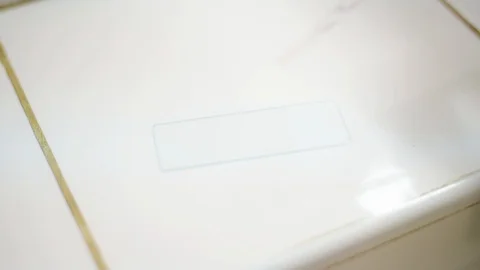 Hand scientist dropping sample on glass slide. Stock Footage 128020554