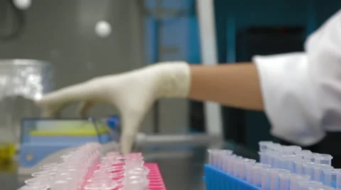 Hand Of A Scientist Taking A Sample Tube Video stock 61457679