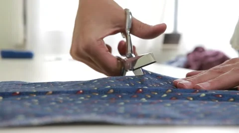 Hand with scissors cutting cloth Stock-Footage 62421983