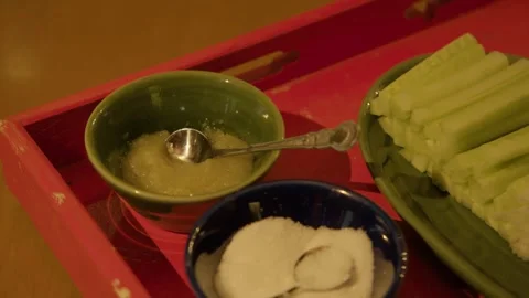 Hand Scooping Condiment Beside Sliced Vegetables and Seasoning in Beijing Stock Footage 345774661
