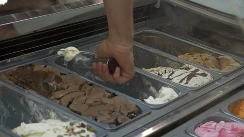 Hand scooping ice cream Stock Footage 86658196