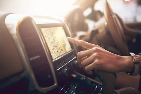 Hand, screen and map navigation in car for person on travel, driving and Stock Photos