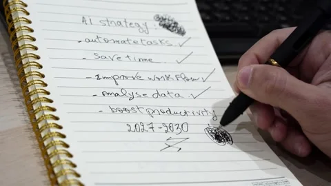 Hand Scribbling On AI Strategy Notebook Stock Footage 340829400