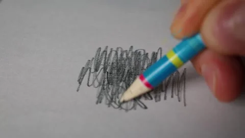 Hand Scribbling with Graphite Pencil on Paper for Graphene Science Research Stock Footage 339365598