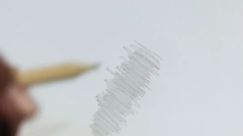 Hand Scribbling Pencil on White Paper Close Up Stock Footage 329478271