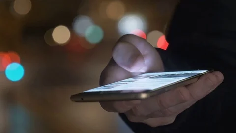 Hand scrolling browsing on a smartphone Stock Footage 81930833