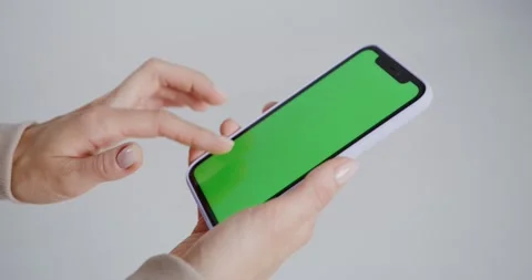 Hand scrolling green screen mobile Stock Footage 238388796