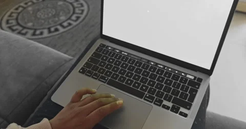 Hand scrolling on laptop. Working at home on couch. Stock Footage 319070877