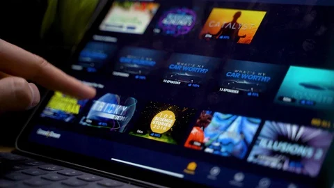Hand scrolls iPad Pro app extreme close up shot, Curiosity Stream Stock-Footage 129153468