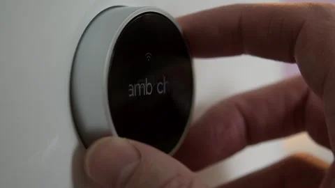 Hand scrolls smart air fryer presets to fish program and starts cooking timer on Stock Footage 327450308