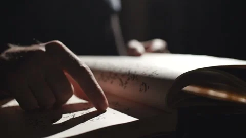Hand searching through old dusty stored manuscripts Stock-Footage 131084697