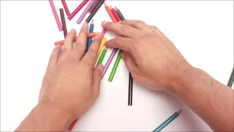 Hand Selecting and Checking Colored Pencils One by One Video stock 347428680