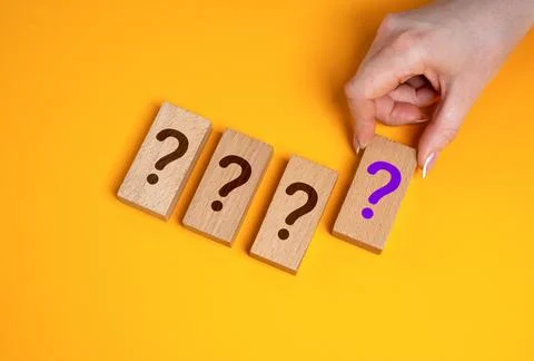 The hand selects unknown options from those presented. Quiz. Unknown prizes.. Stock Photos