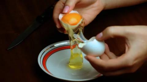 Hand Separating Egg Stock Footage 30140096