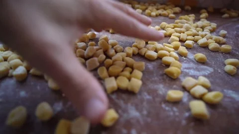 Hand separating struffoli balls making them fall, slow motion 스톡 동영상 278841189