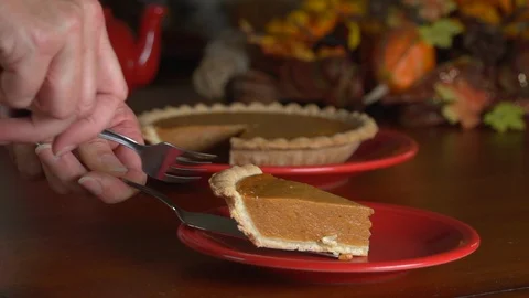 Hand serving pumpkin pie Stock Footage 96553586