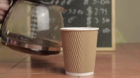 Hand serving takeout coffee in cafe close up shot Stock Footage 135174691