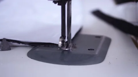 Hand on Sewing Machine Video stock 104904943