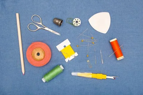 Hand Sewing Tools and Spools of Thread Stock Photos