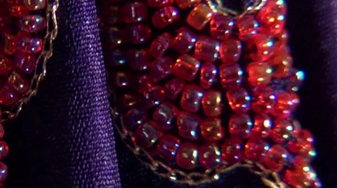 Hand sewn beads on sash Stock Footage 49306228