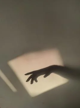 Hand shadow on wall Stock Photos