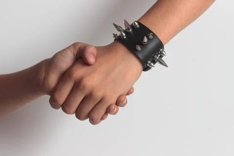 Hand shaking spikes Stock Photos