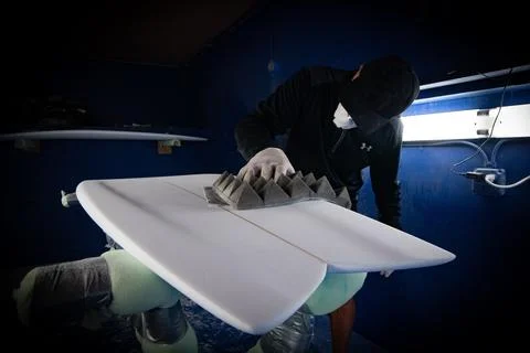 Hand Shaper Shaping a Surfboard Stock Photos