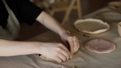 Hand shaping pottery from clay Stock Footage 209952261