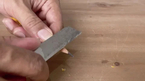 Hand sharpening pencils with a cutter Video stock 345586570