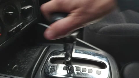 Hand shifting an automatic transmission Video stock 162953118