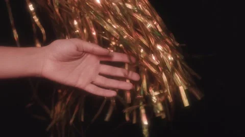 Hand with Shiny Metallic Decorations 스톡 동영상 303870657