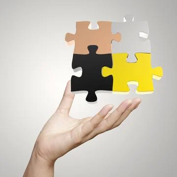 Hand showing 3d puzzle as concept Stock Photos