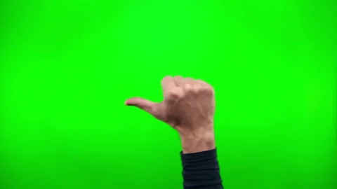 Hand showing bad thumbs down sign isolated on green screen background with Stock Footage 329827665