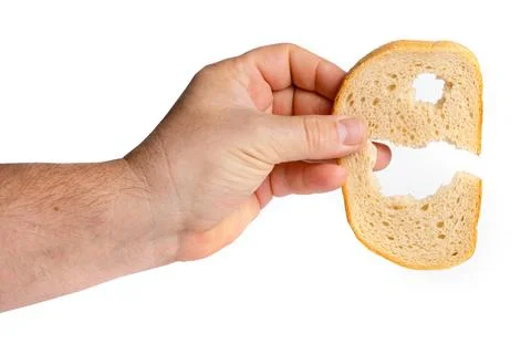Hand Showing Bread Slice with Hole 스톡 사진