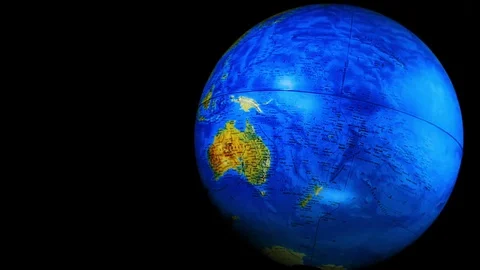 Hand showing compass close to a world globe Stock Footage 78249359