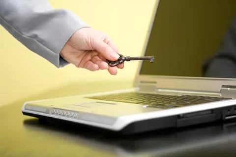 Hand showing key Stock Photos