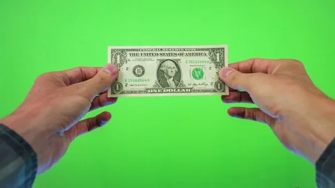 Hand showing one dollar note isolated on green screen background Видео 84084107