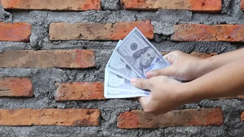 Hand showing several dollar bills Stock Footage 323334827
