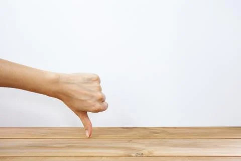 Hand showing thumb down Stock Photos