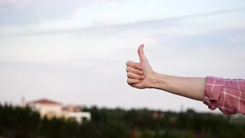 Hand showing thumbs down gesture Stock Footage 132604425