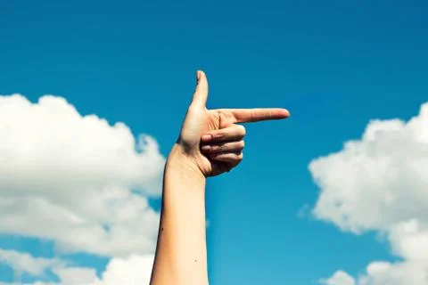 A hand shows the direction Stock Photos