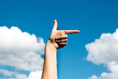 A hand shows the direction Stock Photos