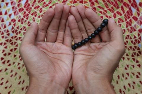The hand that shows the gesture of praying Stock Photos