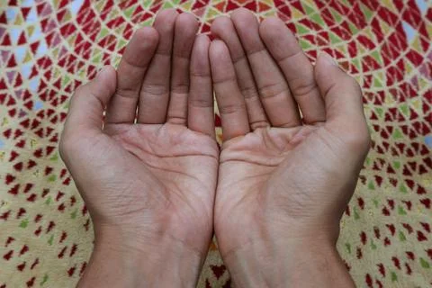 The hand that shows the gesture of praying Stock Photos