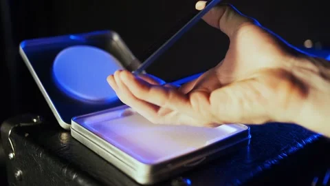 Hand shows ND filter and put it away Stock Footage 156636632