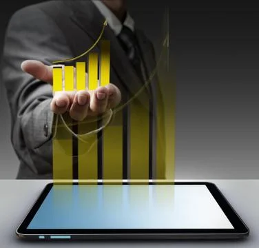 Hand shows virtual gold graph with tablet computer Illustrazione stock