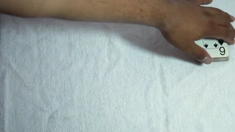 Hand shuffling the deck of cards Stock Footage 146041888