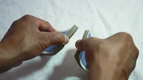 Hand shuffling the deck of cards Stock Footage 146041908